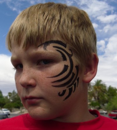 Face Painting on Party Tribal Face Paint Face Painting Illusions And Balloon Art Llc